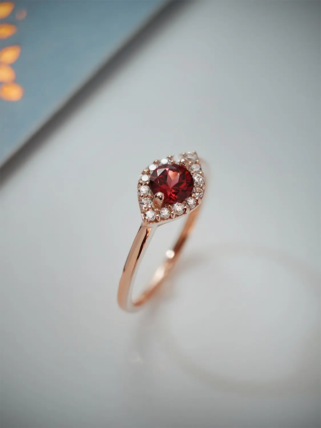 Minimalist red garnet ring in rose gold