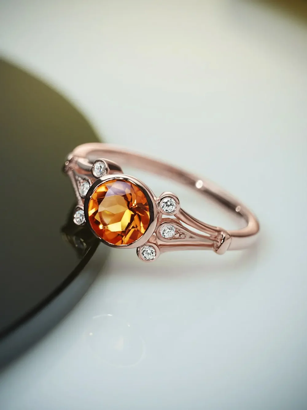 Rose gold plated citrine ring with moissanite accents