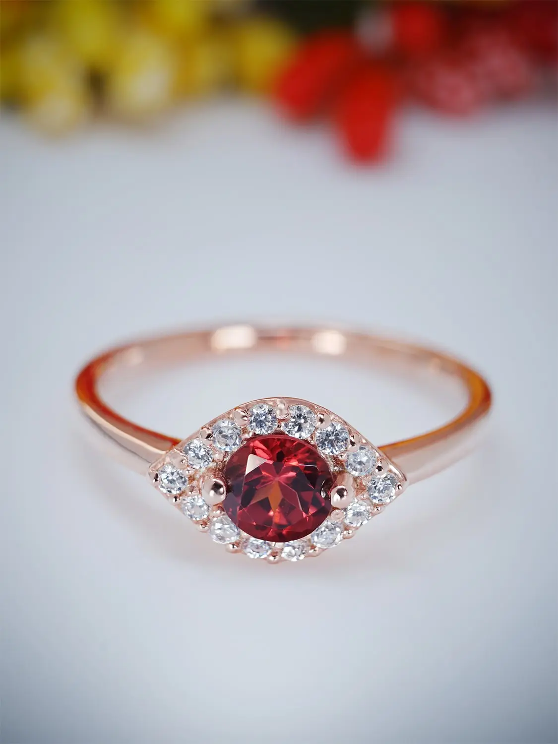 Minimalist red garnet ring in rose gold