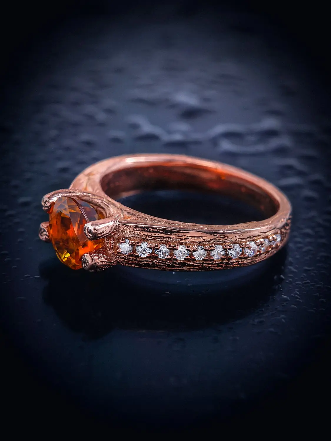 Luxurious citrine ring Citrine wooden textured ring against a dark, regal background, highlighting its royal allure
