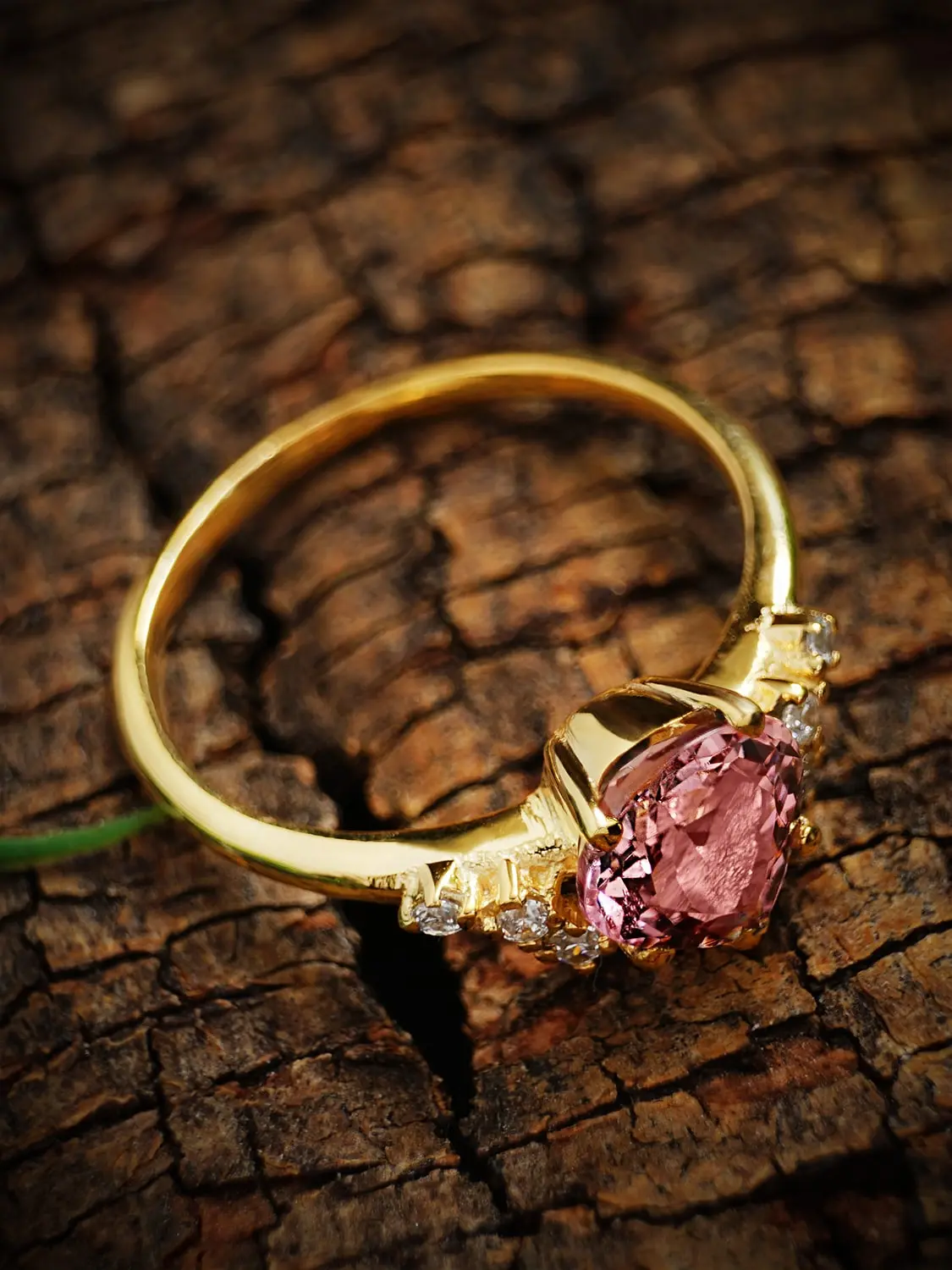 Elegant pink tourmaline heart ring with moissanite accents in sterling silver