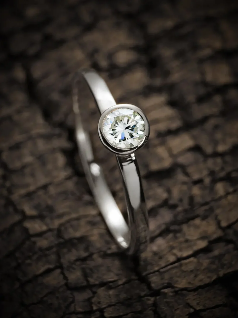 Classic solitaire moissanite ring in sleek silver setting