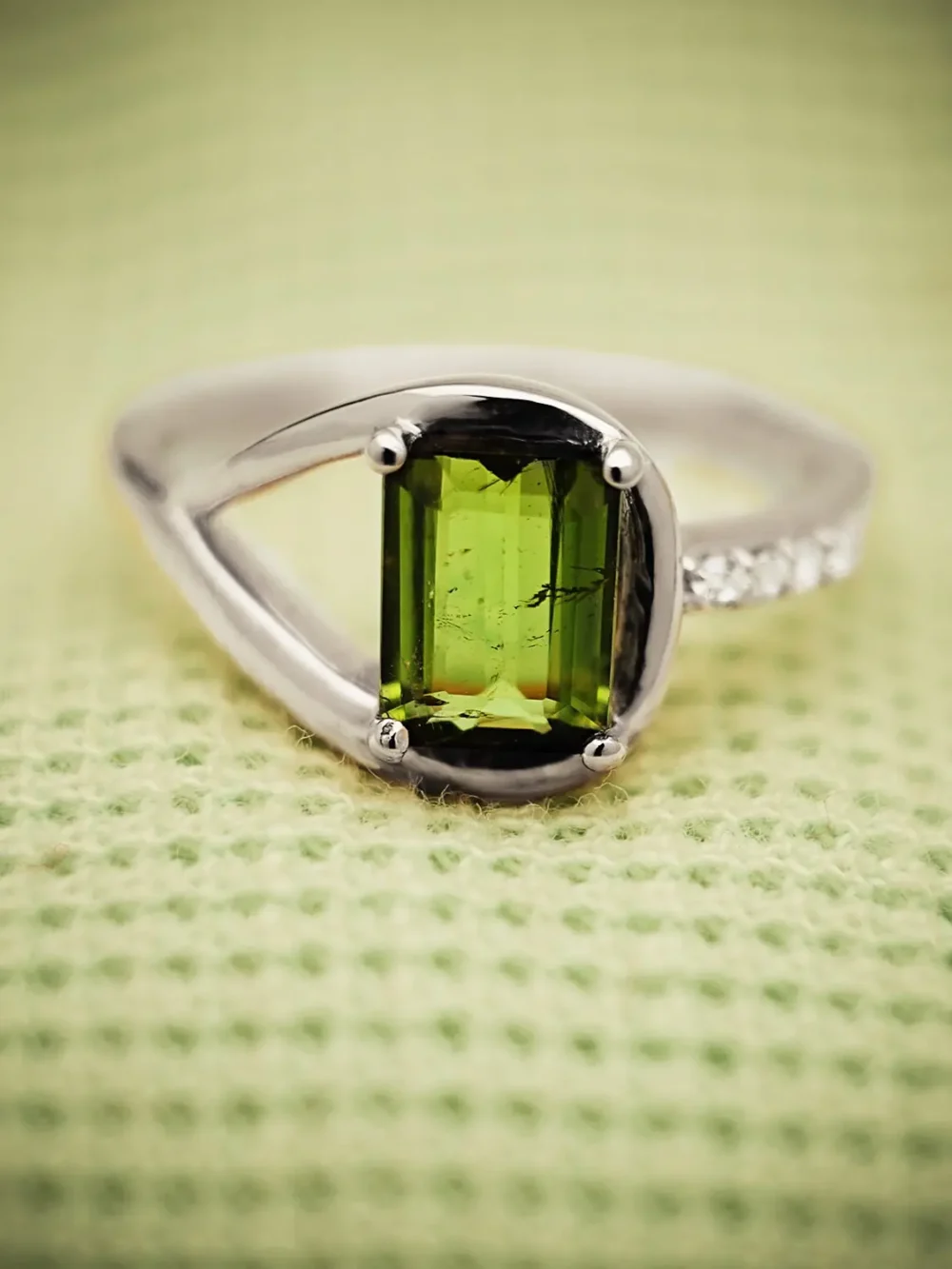 Elegant emerald-cut tourmaline ring with moissanite accents
