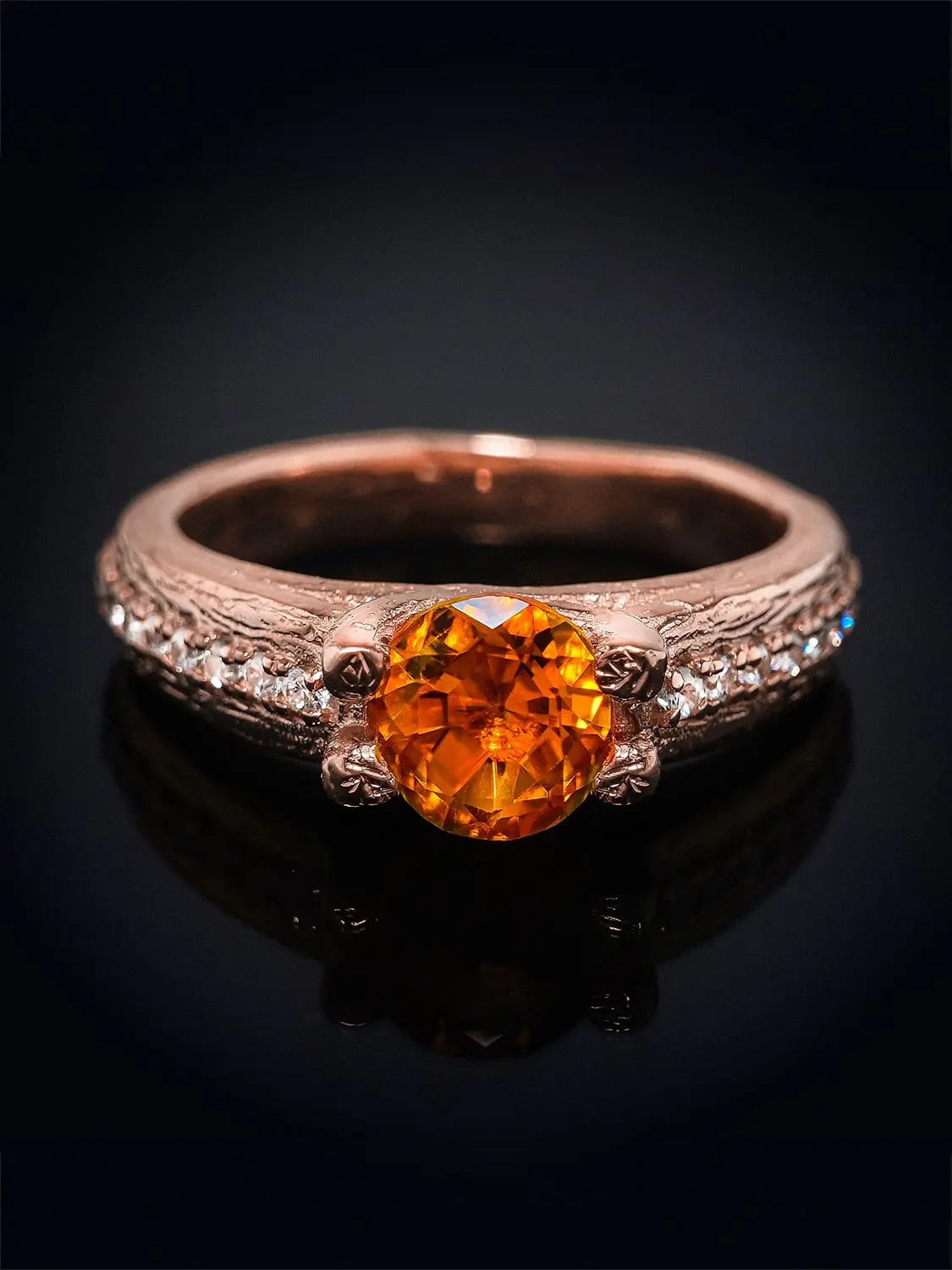 Luxurious citrine ring Luxurious citrine ring profile view in rose gold, echoing ancient royal elegance