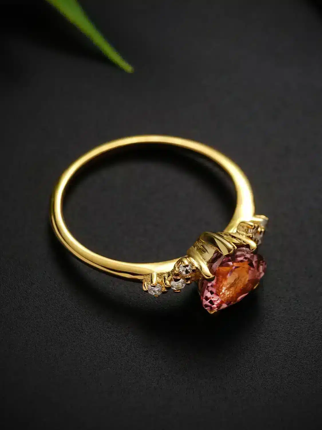 Elegant pink tourmaline heart ring with moissanite accents in sterling silver