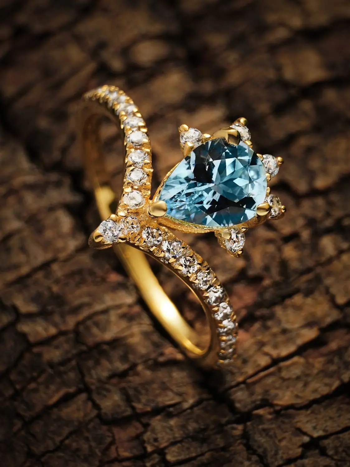 Stellar glow blue topaz ring