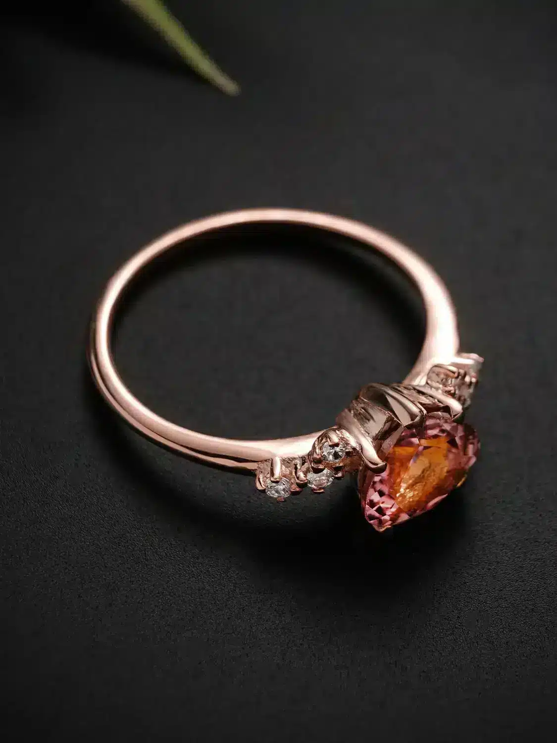 Elegant pink tourmaline heart ring with moissanite accents in sterling silver