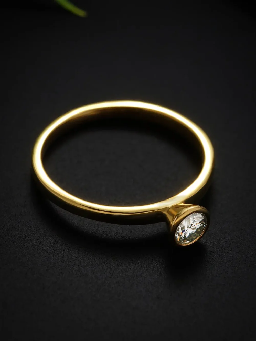 Elegant moissanite solitaire ring in gold plated sterling silver
