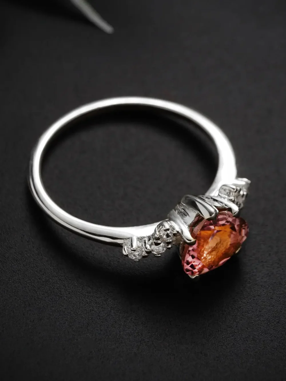 Elegant pink tourmaline heart ring with moissanite accents in sterling silver
