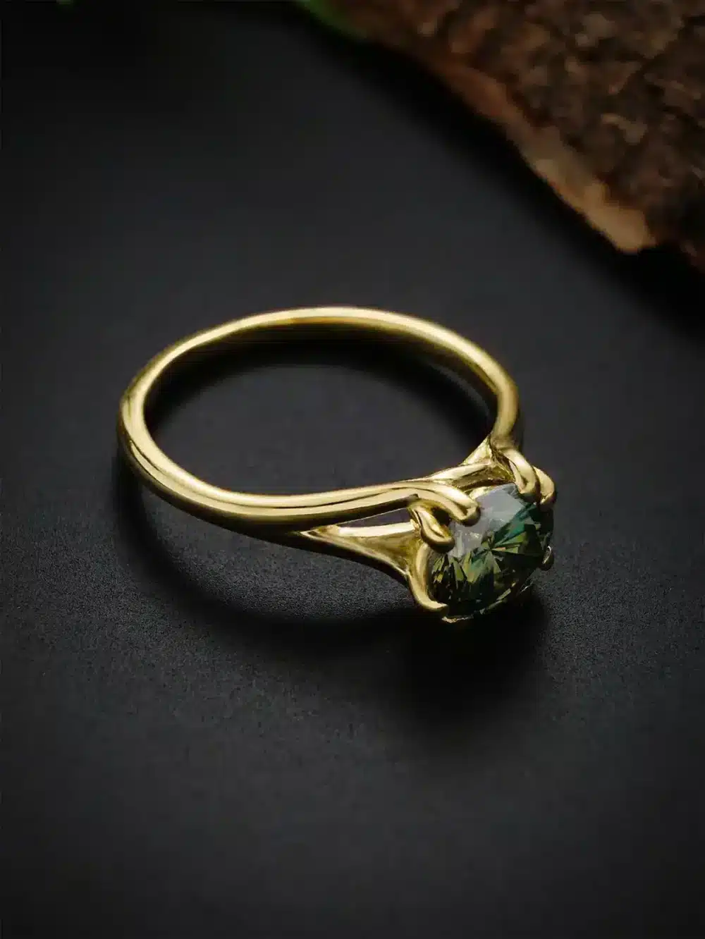 Luxurious green moissanite ring showcased with a spotlight effect