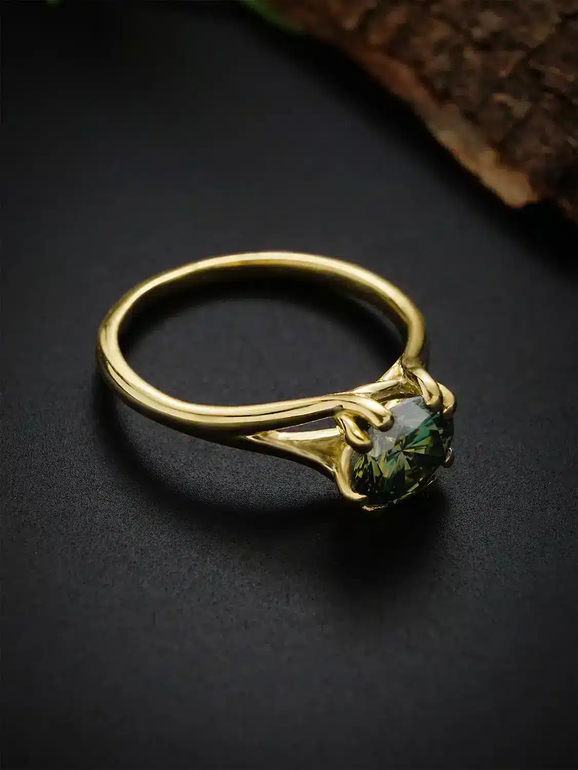 Luxurious green moissanite ring showcased with a spotlight effect