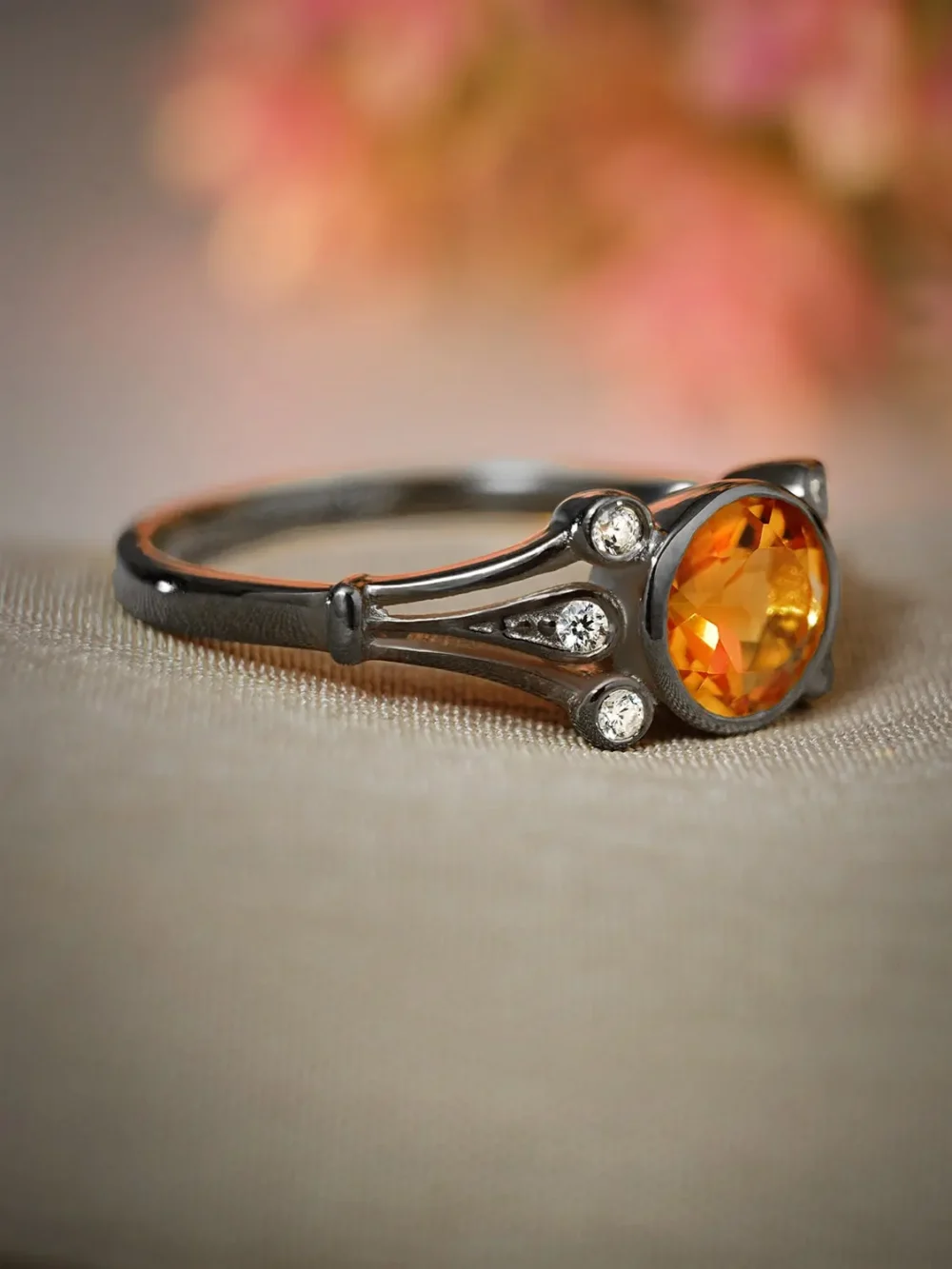 Black rhodium plated ring featuring citrine and moissanite