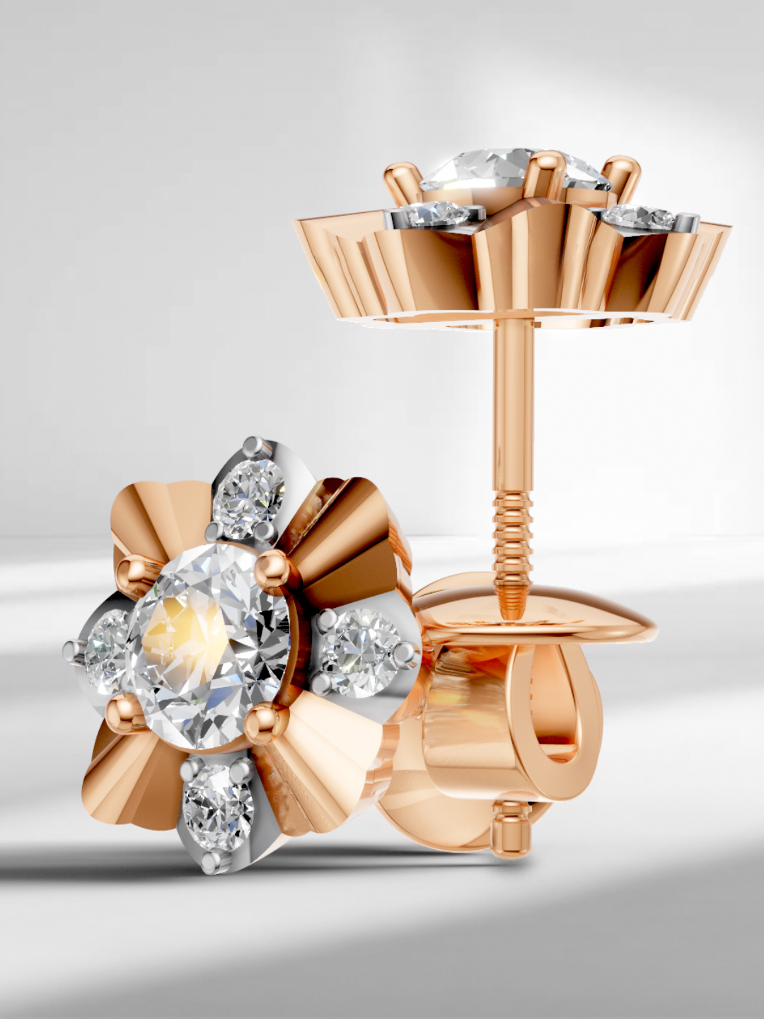 Close-up of white gold and rose gold plated moissanite diamond studs