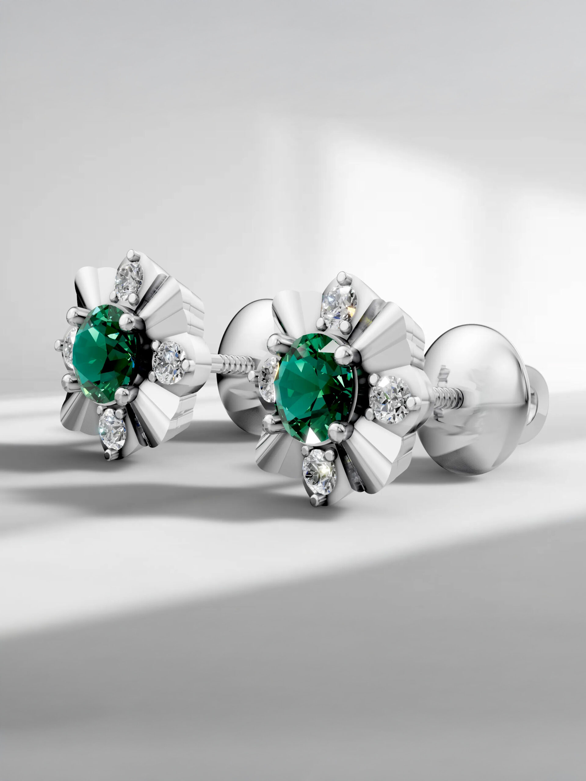 Winter blossom emerald studs - white gold plated