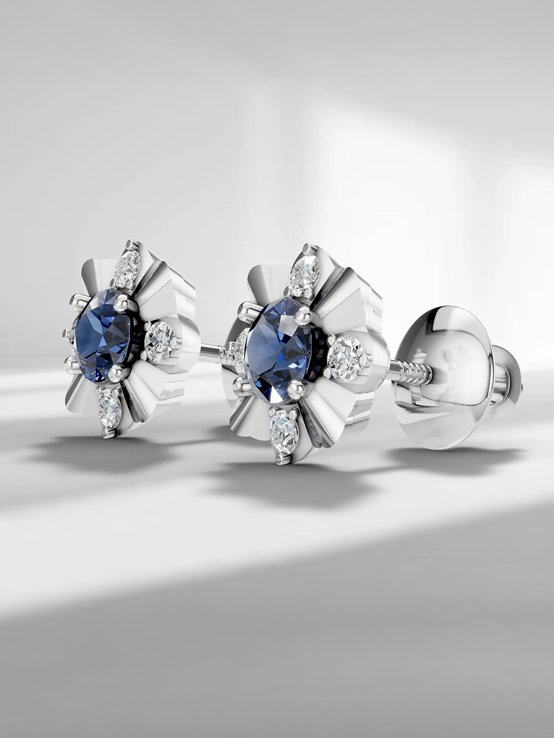 Winter blossom sapphire studs - white gold plated