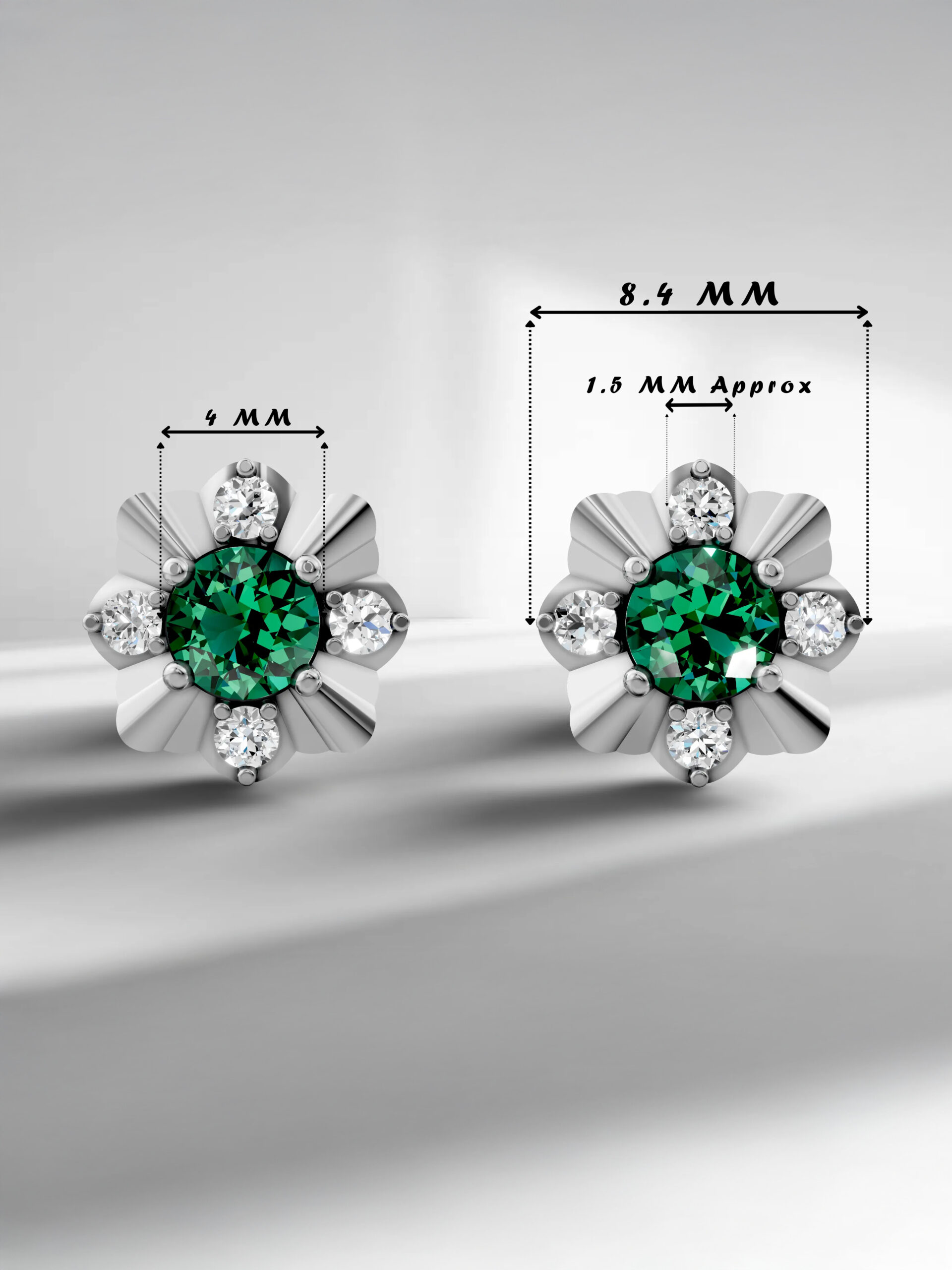 Winter blossom emerald studs - white gold plated with specs
