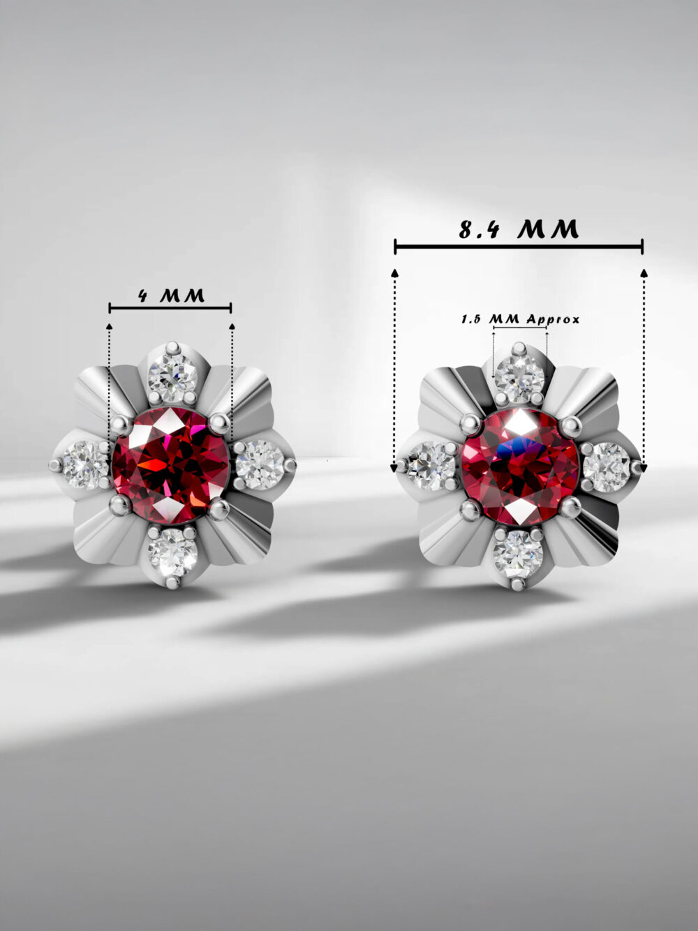 Winter blossom ruby studs - white gold plated with specs