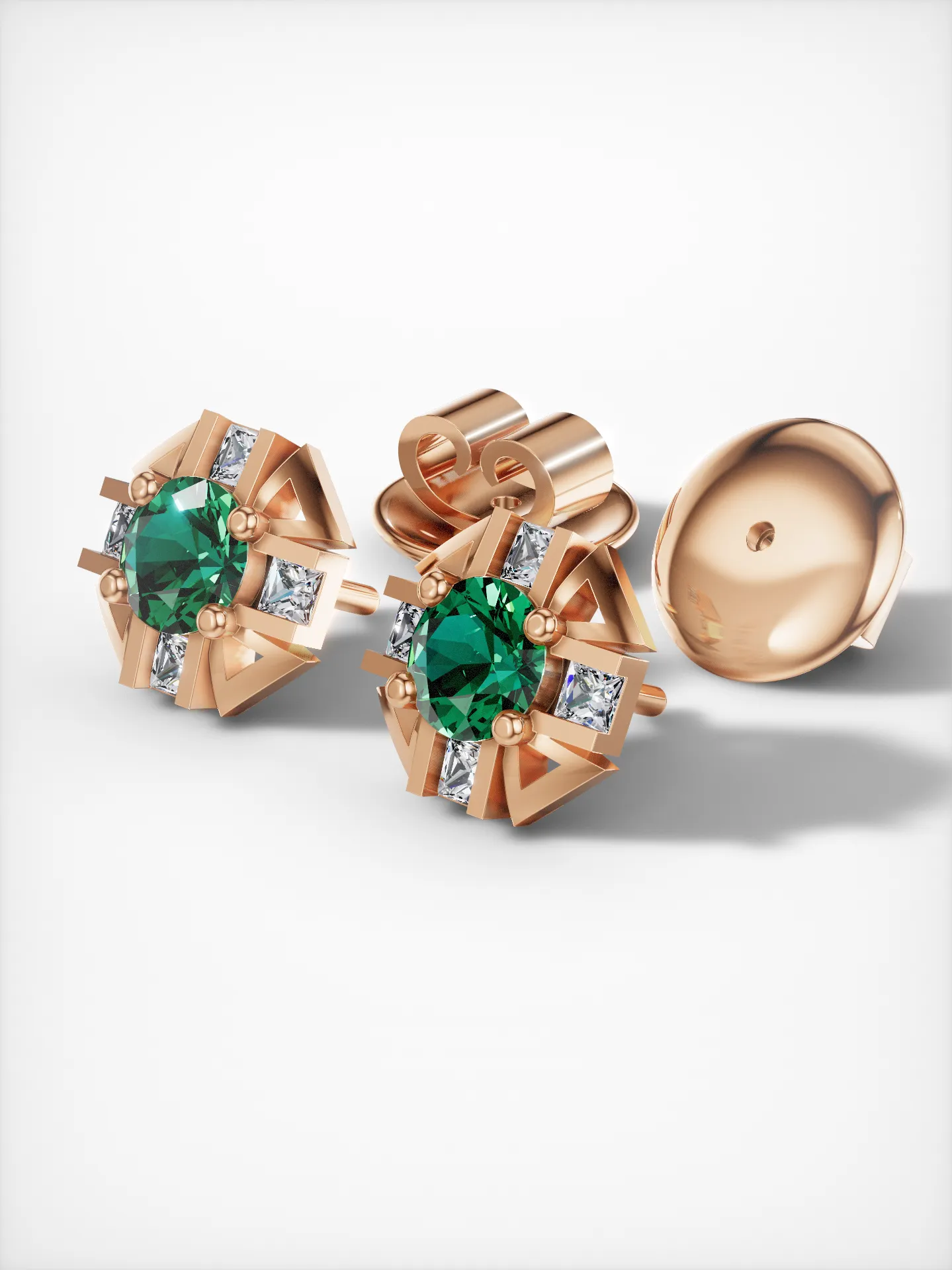 Angled view of rose gold-plated sterling silver emerald stud earrings with moissanite diamonds