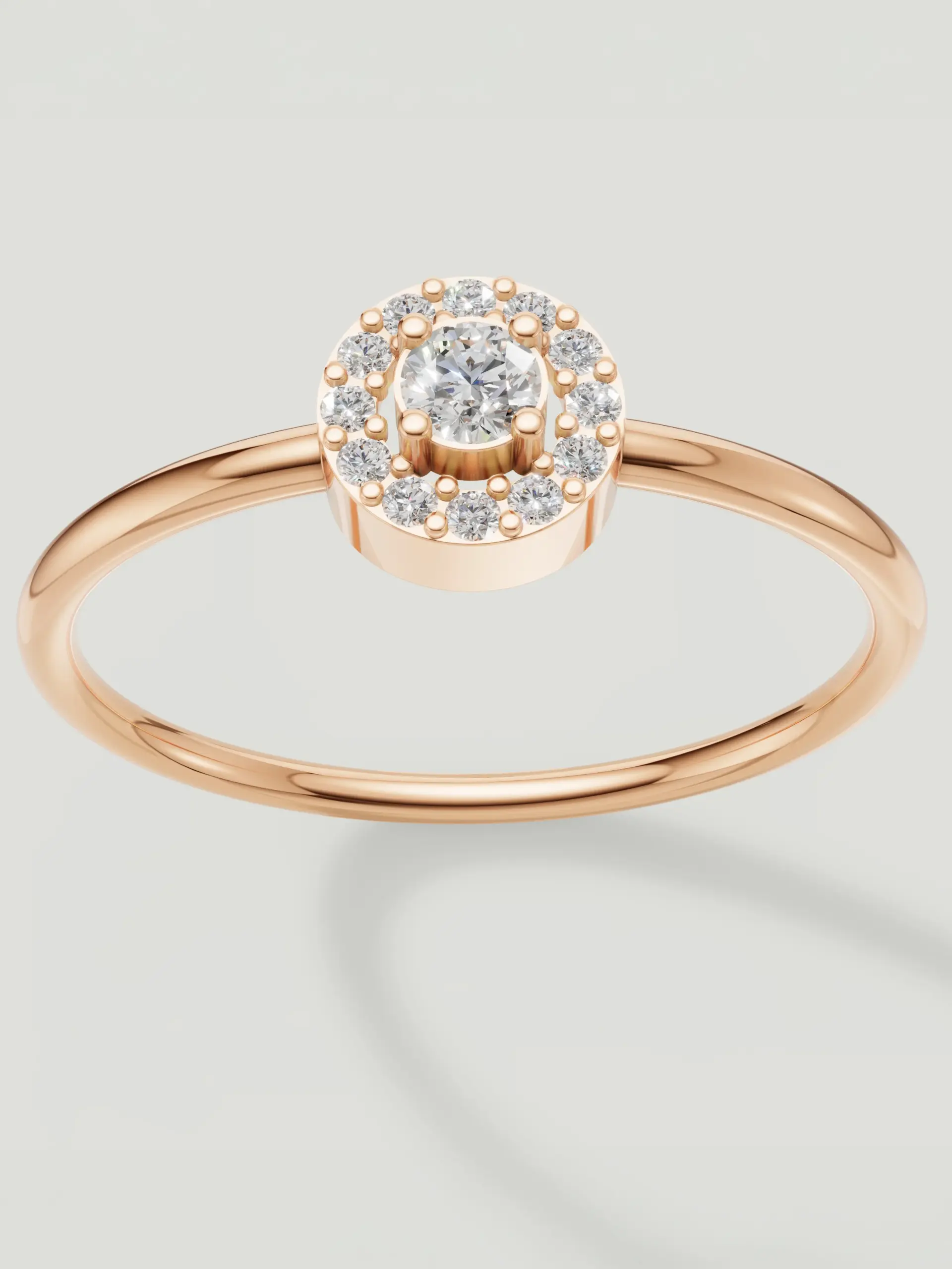 Round Halo Moissanite Ring in Rose Gold Plated 925 Sterling Silver featuring a brilliant halo setting.