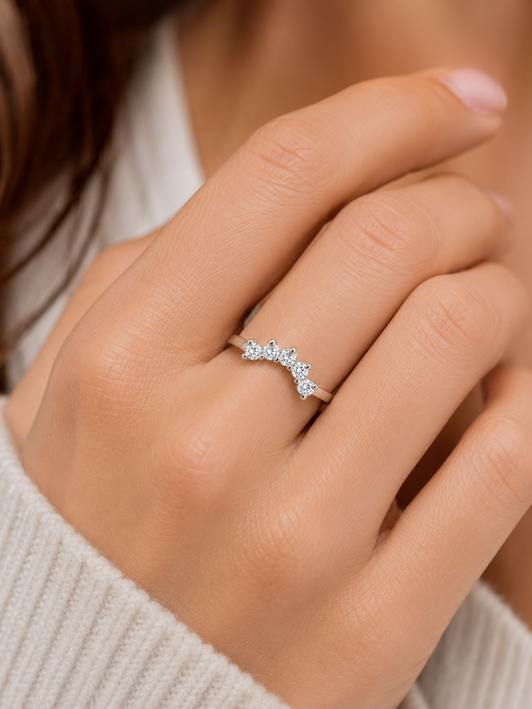 Woman wearing Five Stone Moissanite Curved Ring in 925 Sterling Silver Woman Wearing Seven Stone Moissanite Curved Ring in 925 Sterling Silver