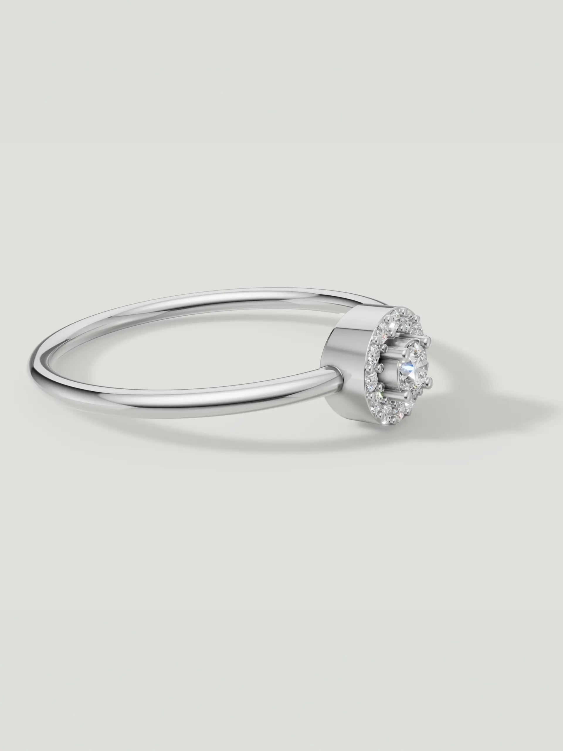 Elegant side view of the Celeste Round Halo Moissanite Ring handcrafted in White Gold plated 925 Sterling Silver.