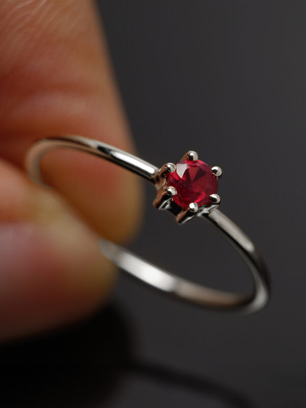 Close-up of 4mm Ruby Solitaire Ring in Sterling Silver