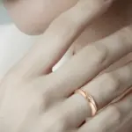 Woman wearing Eternal Wave Moissanite Band Ring