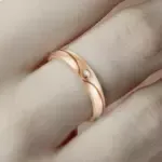 Woman wearing Eternal Wave Moissanite Band Ring